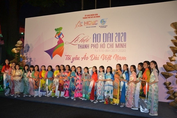 Children in Ao Dai perform on the opening night of the festival.