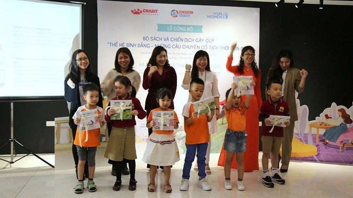 Children presented with the books at the launch ceremony.