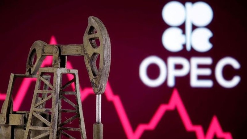 A 3D printed oil pump jack is seen in front of displayed stock graph and Opec logo in this illustration picture, April 14, 2020. (Photo: Reuters)