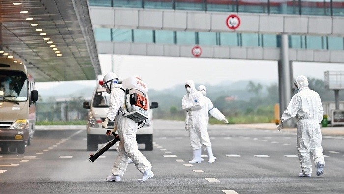 Medical staff disinfecting Van Don International Airport in Quang Ninh. (Photo: VNA)