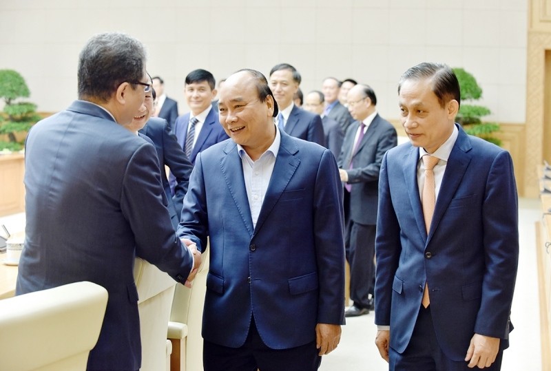 PM Nguyen Xuan Phuc and delegates at the reception. (Photo: NDO/Tran Hai)