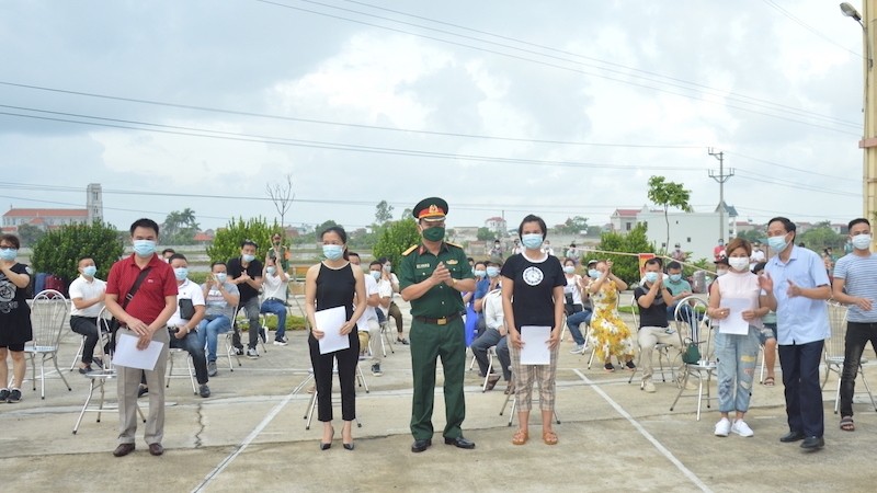 Citizens complete their quarantine duration at a facility in Nam Dinh province 