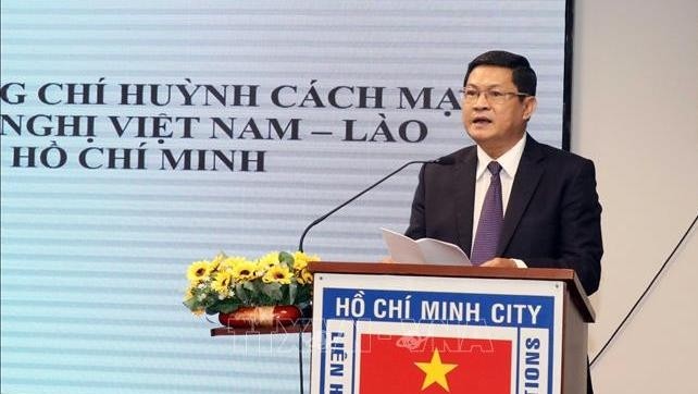 President of the Vietnam-Laos Friendship Association – HCM City chapter Huynh Cach Mang addressing the event (Photo: VNA)