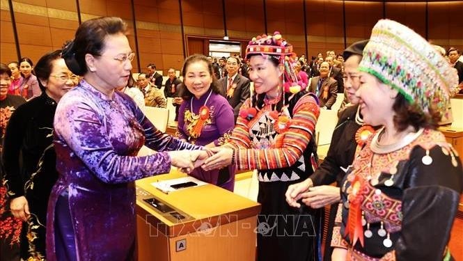 Chairwoman of the National Assembly Nguyen Thi Kim Ngan (L) and delegates at the event (Photo: VNA)