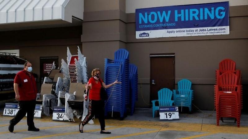 A “Now Hiring” sign advertising jobs at Lowe's is seen as the spread of COVID-19 continues, in Homestead, Florida, US, April 17, 2020. (Photo: Reuters)