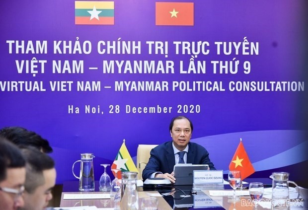 Vietnamese Deputy Foreign Minister Nguyen Quoc Dung at the online 9th Vietnam-Myanmar political consultation on December 28 (Photo: baoquocte.vn)