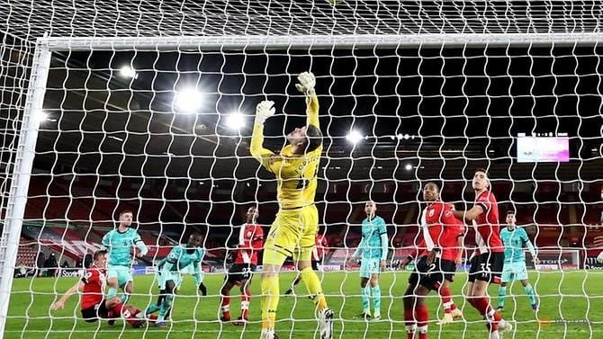 Soccer Football - Premier League - Southampton v Liverpool - St Mary's Stadium, Southampton, UK - January 4, 2021 Southampton's Fraser Forster makes a save from Liverpool's Sadio Mane. (Reuters)