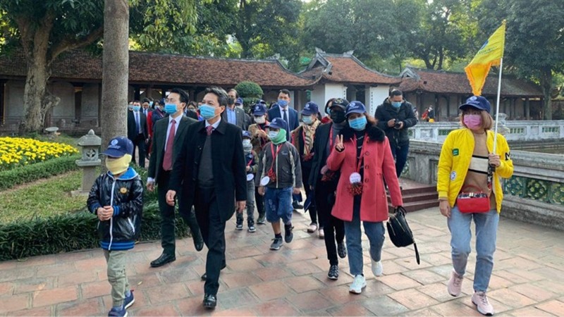 Visitors to Van Mieu - Quoc Tu Giam (Temple of Literature) in Hanoi