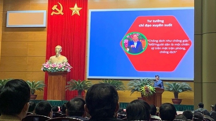 Minister of Health Nguyen Thanh Long reports on the results of the medical sector's activities in 2020 at the National Health Conference in Hanoi on January 6, 2021. (Photo: NDO/Thien Lam)