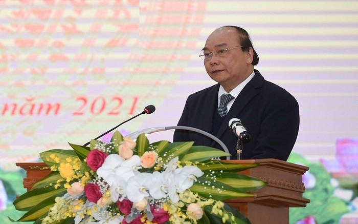 Prime Minister Nguyen Xuan Phuc speaks at the conference. 