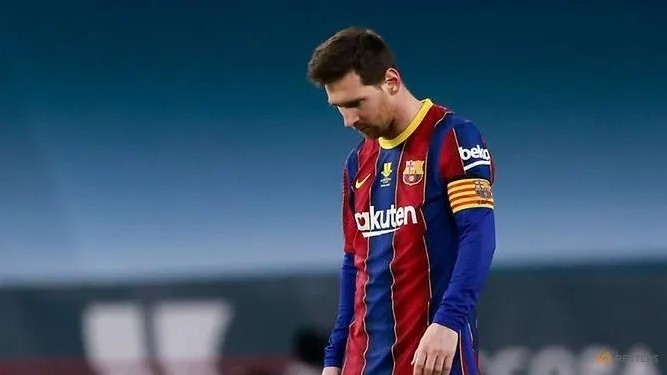 Barcelona's Lionel Messi looks dejected after Athletic Bilbao's Asier Villalibre scores their second goal in the Spanish Super Cup final at Estadio La Cartuja de Sevilla in Seville, Spain, on Jan 17, 2021. (Reuters)