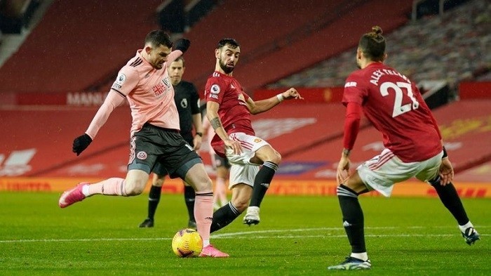 Soccer Football - Premier League - Manchester United v Sheffield United - Old Trafford, Manchester, Britain - January 27, 2021 Sheffield United's Oliver Burke scores their second goal. (Photo: Pool via Reuters)