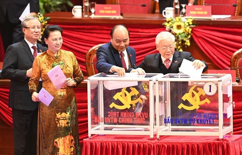 Party General Secretary and State President Nguyen Phu Trong, Prime Minister Nguyen Xuan Phuc, National Assembly Chairwomen Nguyen Thi Kim Ngan and permanent member of the Party Central Committee’s Secretariat Tran Quoc Vuong cast their ballots to elect the 13th-tenure Party Central Committee. (Photo: Trong Hai)