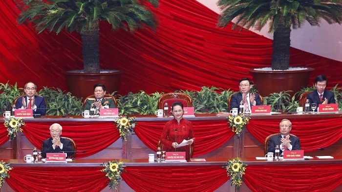 National Assembly Chairwoman Nguyen Thi Kim Ngan (standing) chairs the closing session of the Congress on behalf of the Presidium. (Photo: VNA)