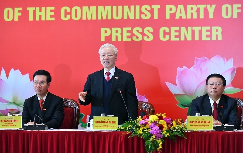 Party General Secretary and State President Nguyen Phu Trong (standing) speaks at the press conference (Photo: NDO)