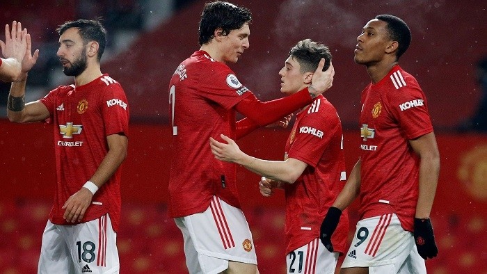 Soccer Football - Premier League - Manchester United v Southampton - Old Trafford, Manchester, Britain - February 2, 2021 Manchester United's Victor Lindelof, Daniel James, Bruno Fernandes and Anthony Martial celebrate after the match. (Photo: Pool via Reuters)