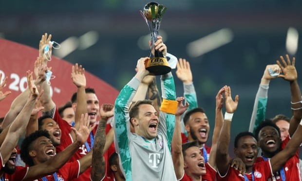 Bayern's Manuel Neuer lifts the trophy at the Education City Stadium in Doha. (Photo: Getty)