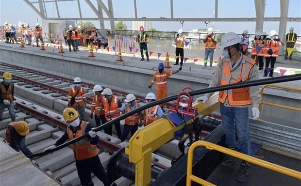Cable pulling work on Ho Chi Minh City's Metro Line No 1 (Photo: VNA)