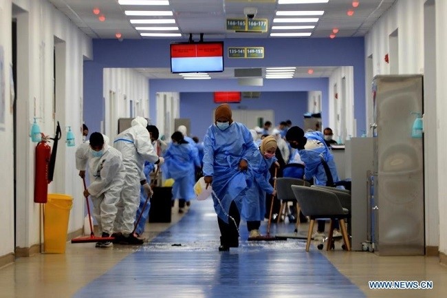 Health workers sterilize a new field hospital for COVID-19 patients near Prince Hamzah Hospital in Amman, capital of Jordan, on March 2, 2021. Jordan on Tuesday reported 29 COVID-19 deaths and 5,124 new cases, raising the death toll to 4,756 and the tally to 402,282, said a joint statement by the Ministry of Health. (Photo: Xinhua)