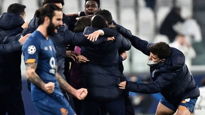 Soccer Football - Champions League - Round of 16 Second Leg - Juventus v FC Porto - Allianz Stadium, Turin, Italy - March 9, 2021 FC Porto players celebrate after the match. (Reuters)