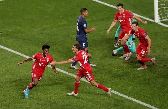 FILE PHOTO: Soccer Football - Champions League - Final - Bayern Munich v Paris St Germain - Estadio da Luz, Lisbon, Portugal - August 23, 2020 Bayern Munich's Kingsley Coman scores their first goal with Thomas Muller, as play resumes behind closed doors following the outbreak of COVID-19. (Reuters)