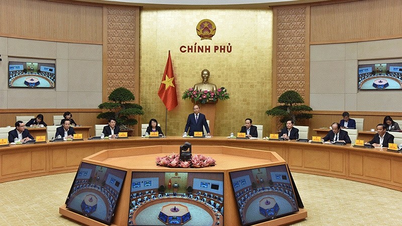 Prime Minister Nguyen Xuan Phuc (standing) speaks at the meeting of the Central Emulation and Rewards Council on March 22, 2021. (Photo: NDO/Tran Hai)
