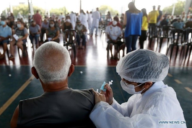 A senior citizen receives a dose of Chinese-developed COVID-19 vaccine in Brasilia, Brazil, on March 22, 2021. (File Photo: Xinhua)