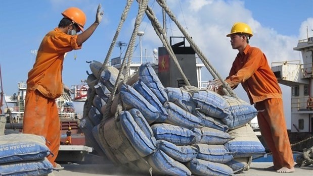 Cement packs loaded for export at Thi Nai Port (Photo: VNA)