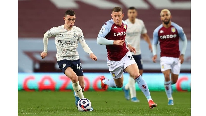 Aston Villa's Ross Barkley in action with Manchester City's Phil Foden. (Photo: Reuters)