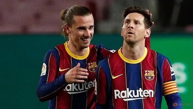 Barcelona's Antoine Griezmann celebrates scoring their fifth goal with Lionel Messi. (Photo: Reuters)