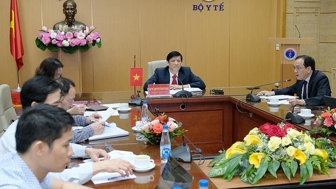 Minister of Health Nguyen Thanh Long at the online meeting. (Photo: Vietnam+)