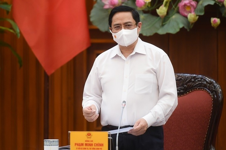 Prime Minister Pham Minh Chinh speaks at the meeting. (Photo: VGP)