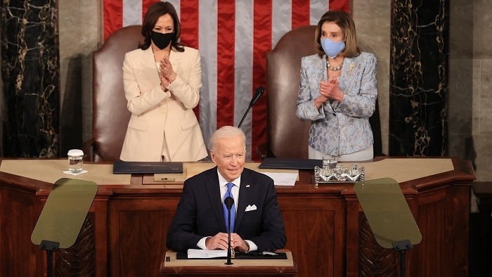 US President Joe Biden addresses a joint session of congress as Vice President Kamala Harris (L) and Speaker of the House Nancy Pelosi look on in the US Capitol on April 28, 2021. (Photo: Getty Images)