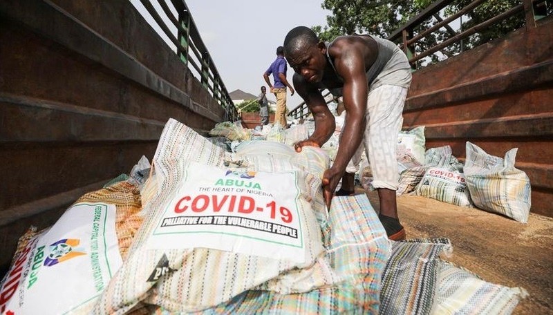 Men load sacks of rice among other food aid in a truck, to be distributed to those affected by procedures taken to curb the spread of coronavirus disease (COVID-19), in Abuja, Nigeria April 17, 2020. (Photo: Reuters)