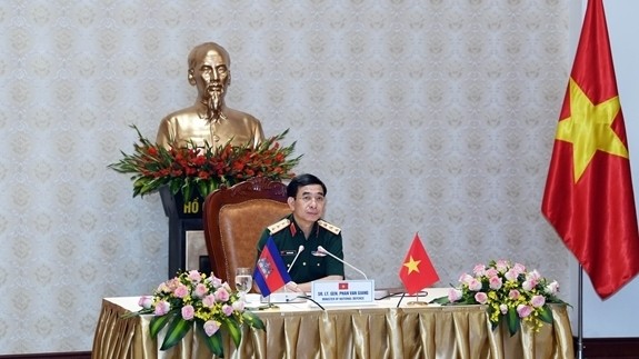 Minister of Defence Phan Van Giang during virtual talks with his Cambodian counterpart (Photo: QDND)