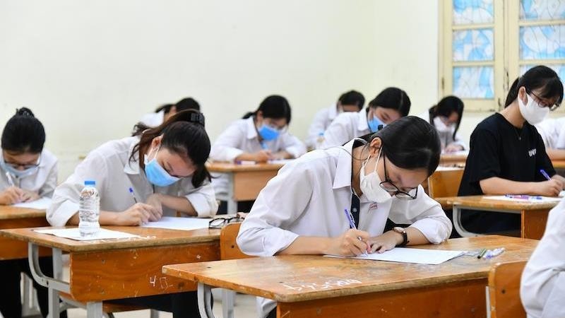 Students wear masks while taking the national high-school examination in 2020.