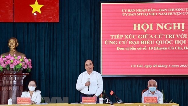 President Nguyen Xuan Phuc speaking at a meeting with voters in Cu Chi district, Ho Chi Minh City on May 9. (Photo: VNA)