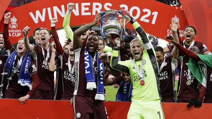 Soccer Football - FA Cup Final - Chelsea v Leicester City - Wembley Stadium, London, Britain - May 15, 2021 Leicester City players celebrate winning the FA Cup with the trophy. (Photo: Pool via Reuters)