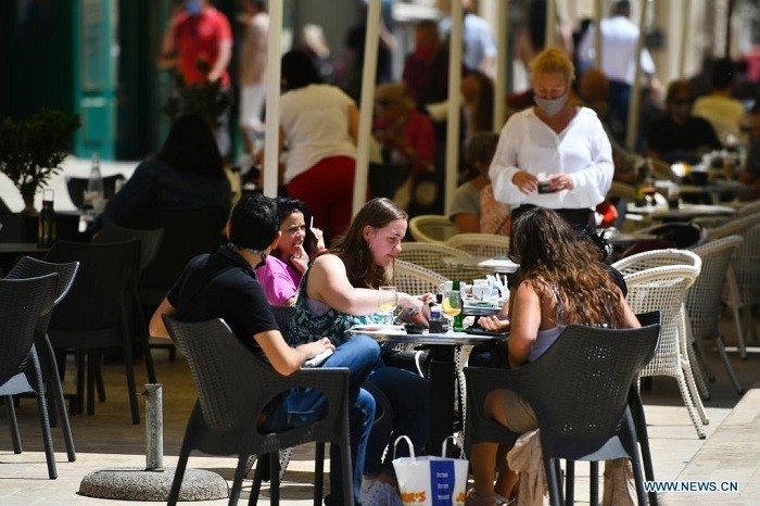 (Image for Illustration). People sit outside a cafeteria in Valletta, Malta, on May 10, 2021. Restaurants and snack bars reopened until 5 p.m. from Monday, as Malta continued the gradual easing of COVID-19 restrictions. (Photo: Xinhua)