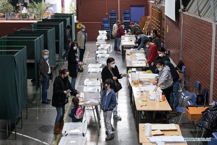 Voters register to cast their ballots at a voting center in Santiago, Chile, on May 15, 2021. Chile on Saturday began historic elections, in which, for the first time, a Constitution Convention comprised of 155 members will be elected to draft the country's new constitution. The 14.9 million Chilean voters will also choose mayors, councilors and other officials in the elections. (Photo: Xinhua)