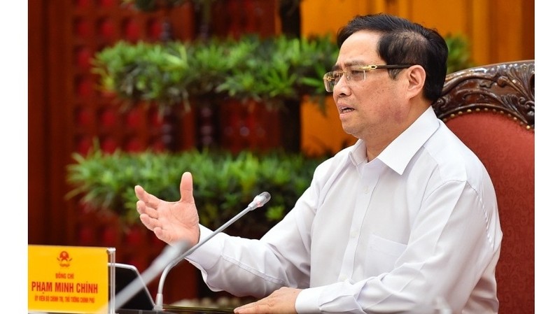 Prime Minister Pham Minh Chinh speaks at the meeting. (Photo: Nhat Bac)