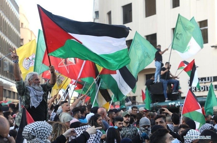People take part in a demonstration to express solidarity with the Palestinian people in downtown Beirut, Lebanon, on May 18, 2021. (Photo: Xinhua)