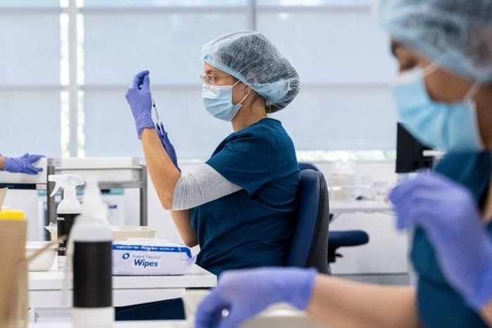 Staff members prepare vaccines at a New South Wales coronavirus disease (COVID-19) mass vaccination hub as it opens at Sydney Olympic Park in Sydney, Australia, May 10, 2021. (Photo: Reuters)