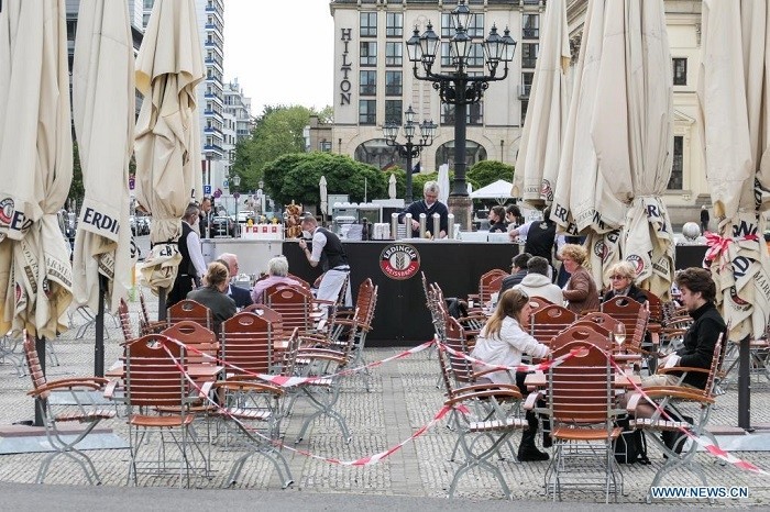 Guests are seen at the outdoor area of a restaurant in Berlin, capital of Germany, May 21, 2021. Restaurants in Berlin are allowed to serve guests outdoors from Friday. (Photo: Xinhua)