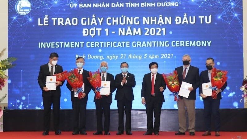Binh Duong authorities grant investment certificates to foreign investors.