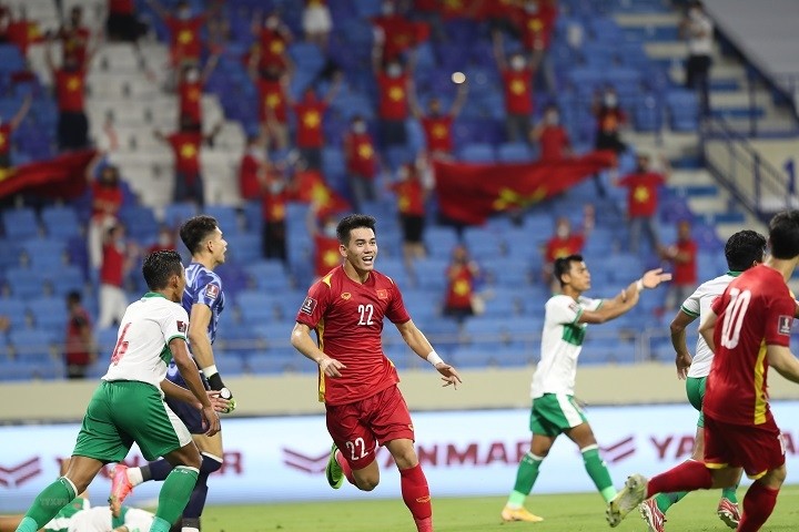 Forward Nguyen Tien Linh celebrates after opening the scoring for Vietnam.