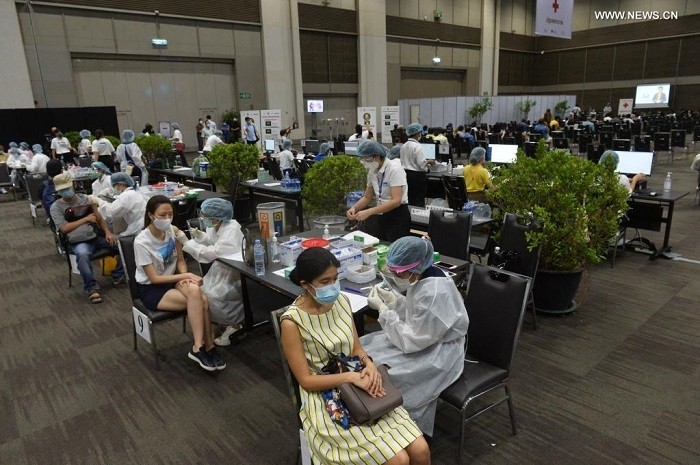 People get vaccinated at a vaccination site in Bangkok, Thailand, June 7, 2021. Thailand accelerated vaccine rollout as it began a mass vaccination program Monday amid efforts to contain its worst COVID-19 outbreak so far and ensure the country's wider reopening to vaccinated foreign visitors. (Photo: Xinhua)