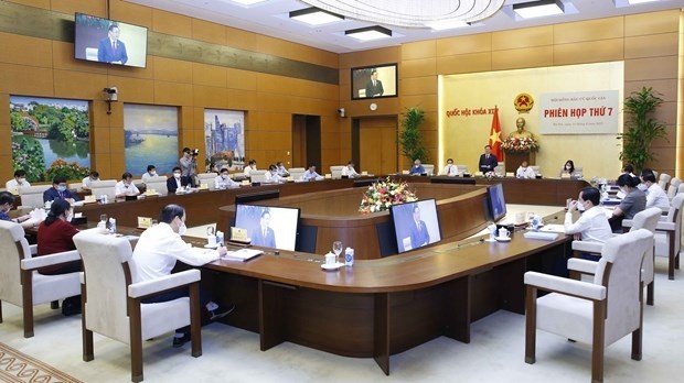 At the seventh meeting of the National Election Council (Photo: VNA)
