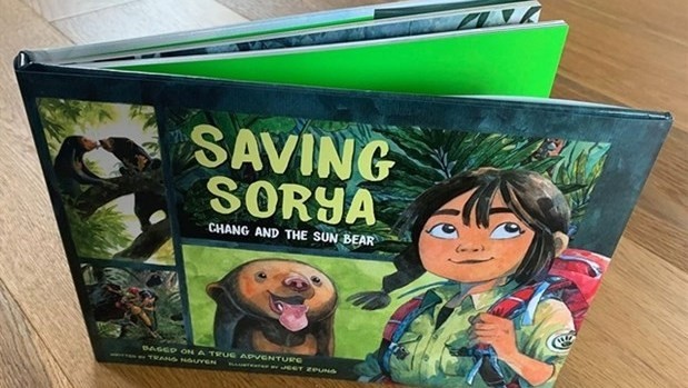 Cover and bookmarks from "Chang Hoang Da - Gau" (Saving Sorya, Chang and The Sun Bear), an art book dedicated to wildlife, available in English. Photo courtesy of the publisher