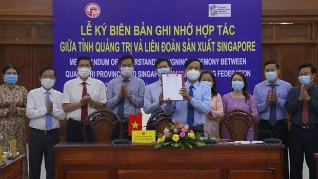 At the signing ceremony (Photo: laodong.vn)